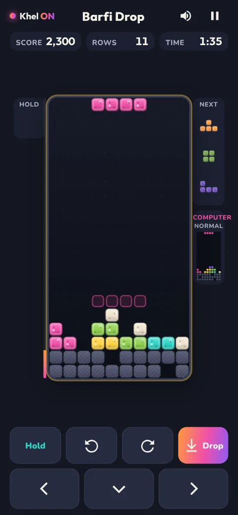 A versus game, with junk rows at the bottom of the tray and the computer's small tray at the side